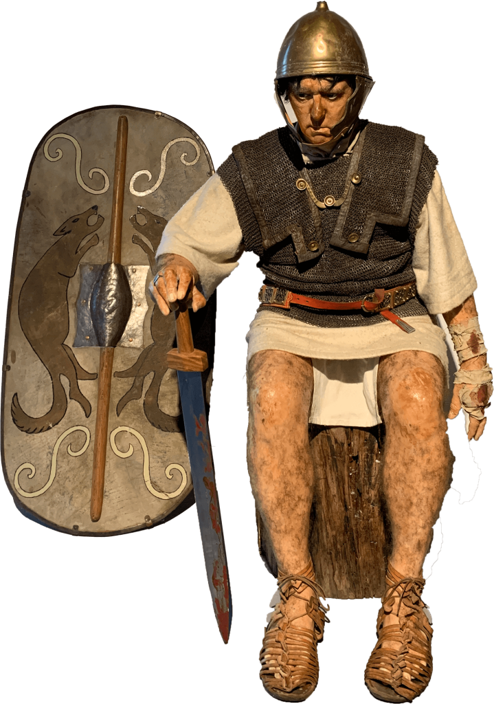 roman soldier sitting with spear and shield