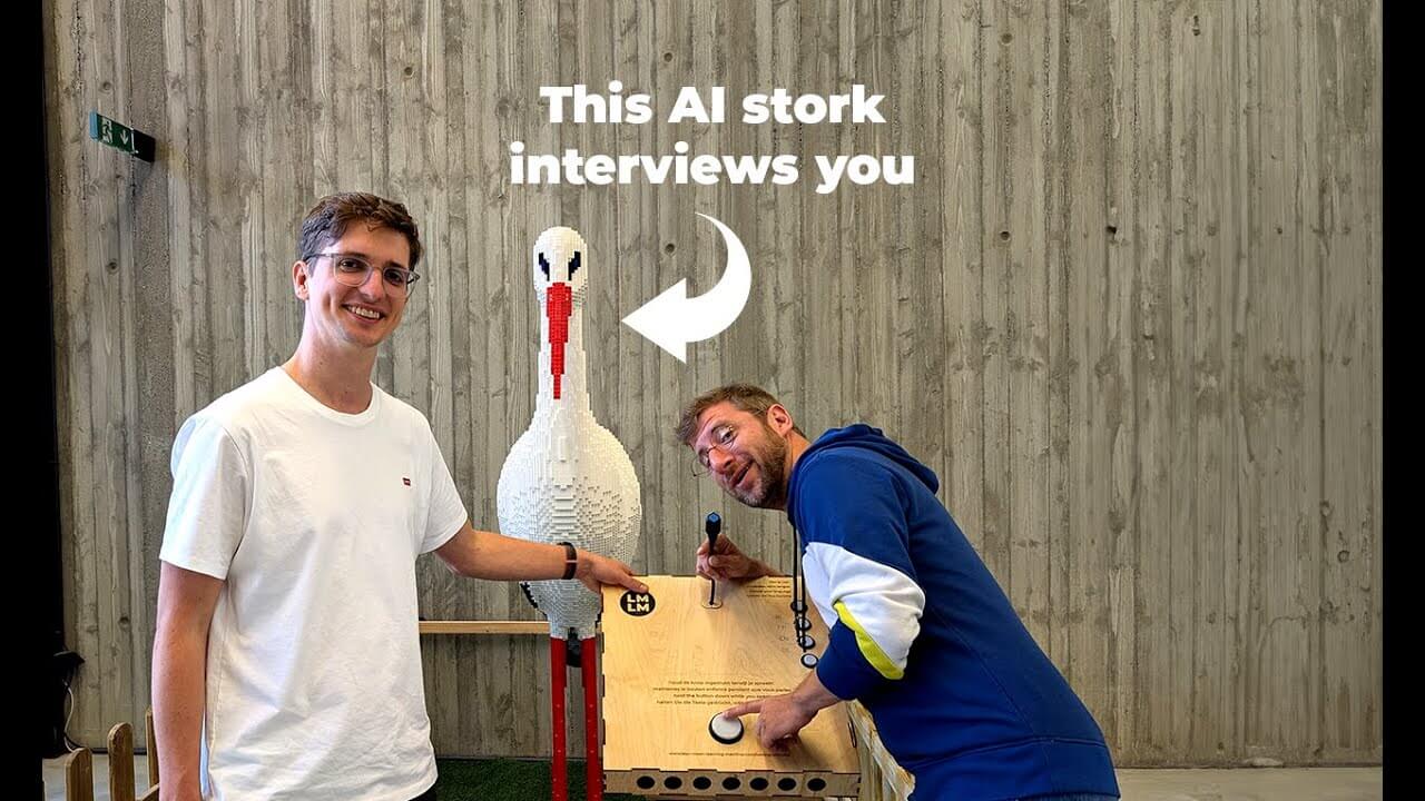 Dries and Dennis with the Lego AI stork interviewer at Zwin Natuur Park, Dennis holding the microphone